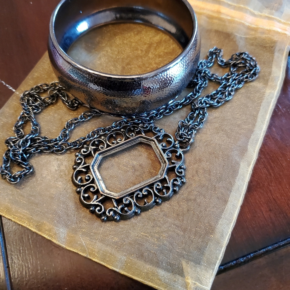 Gunmetal colored bangle and necklace